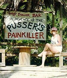 Cheryl paying hommage at the Soggy Dollar Bar