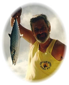 Art holding a Spanish Mackerel
