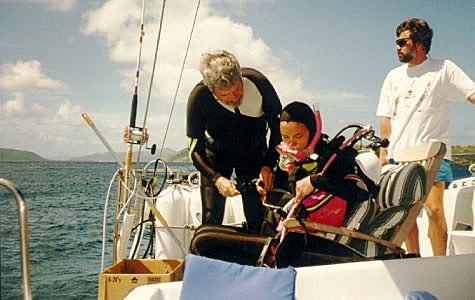 Anne and Art suiting up for the dive