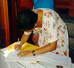 The magistrate signs the register