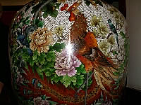 Rooster on a cloisonne vase