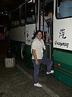 Anne boarding the bus to the Chinese acrobat show