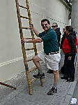 John playing with a ladder