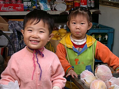 Children playing at the market, Beijing