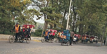 Our group in the rickshaws, Beijing
