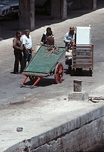 Dock workers with carts