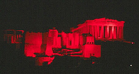 Parthenon at night bathed in red light