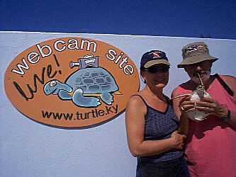 Anne and I holding a small green Turtle