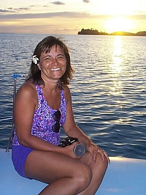 Anne with the setting Sun in the background