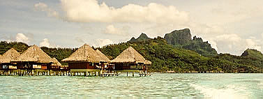 Different views of Bora Bora's mountains with overwater huts