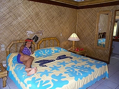 Anne lounging on the king size bed