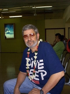 Art sitting in the airport awaiting the trip home